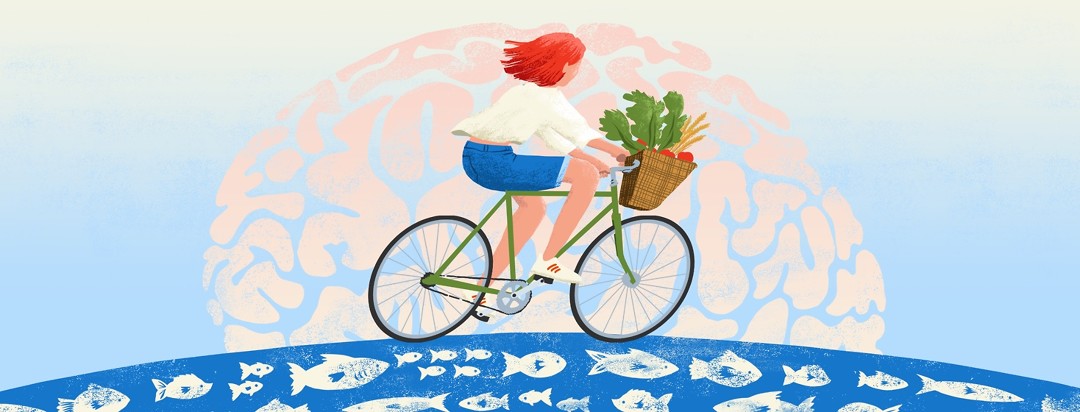 A woman rides a bike with a basket full of fresh veggies. The subtle shape of a brain is in the background and the ground has a fish pattern.