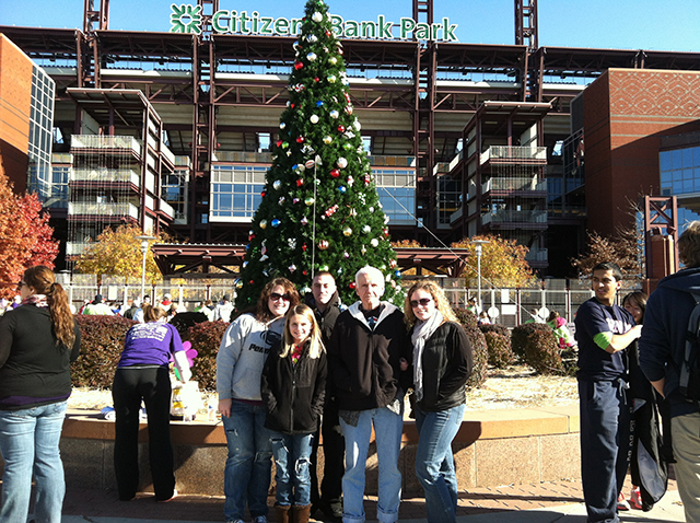 family photo in front of a Christmas tree at the Philadelphia Walk to End Alzheimer’s