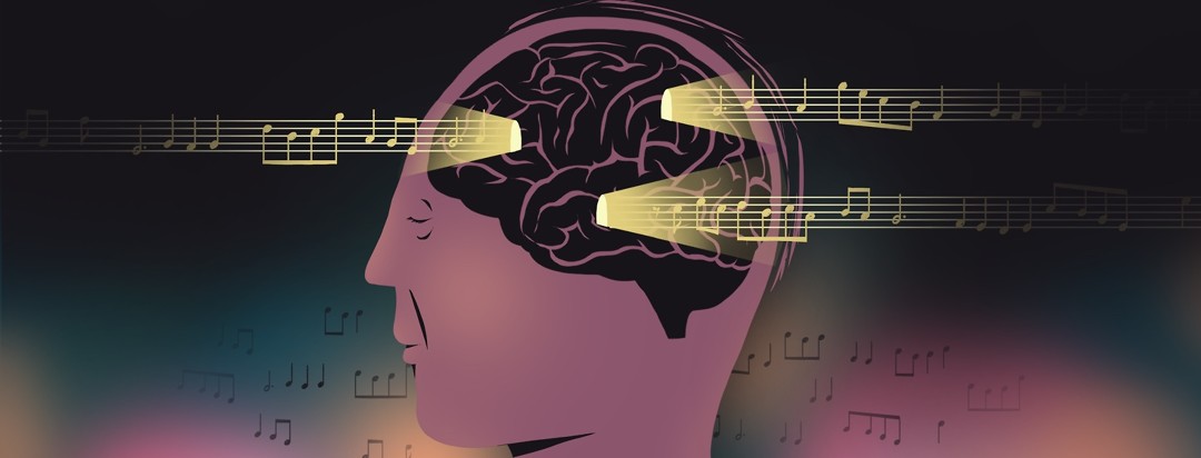 A person's head is seen close-up in profile. Lines of music pass through, lighting up the otherwise dark outlined brain.