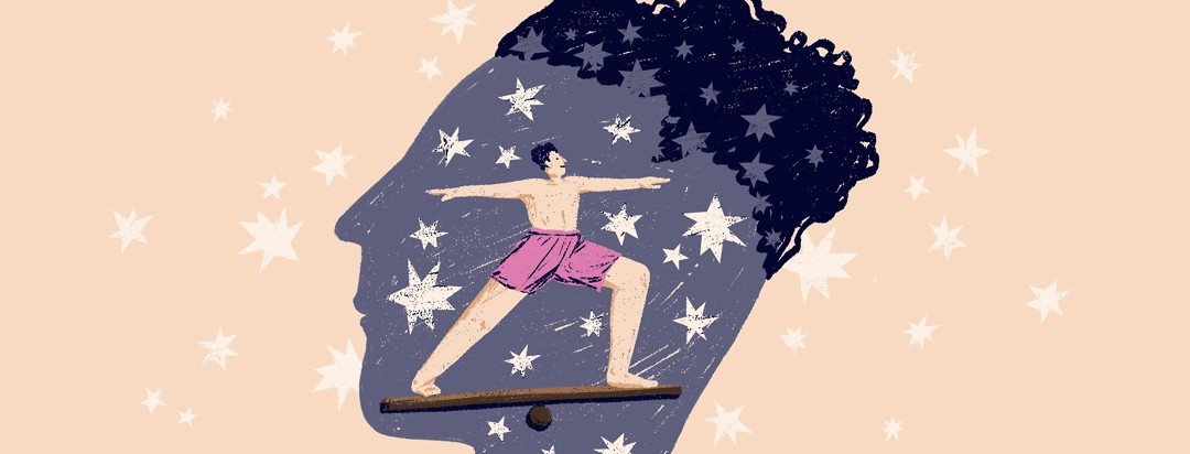 The silhouette of a man's face in profile with stars on it also contains the figure of a man doing the warrior pose, balancing on a wooden plank.