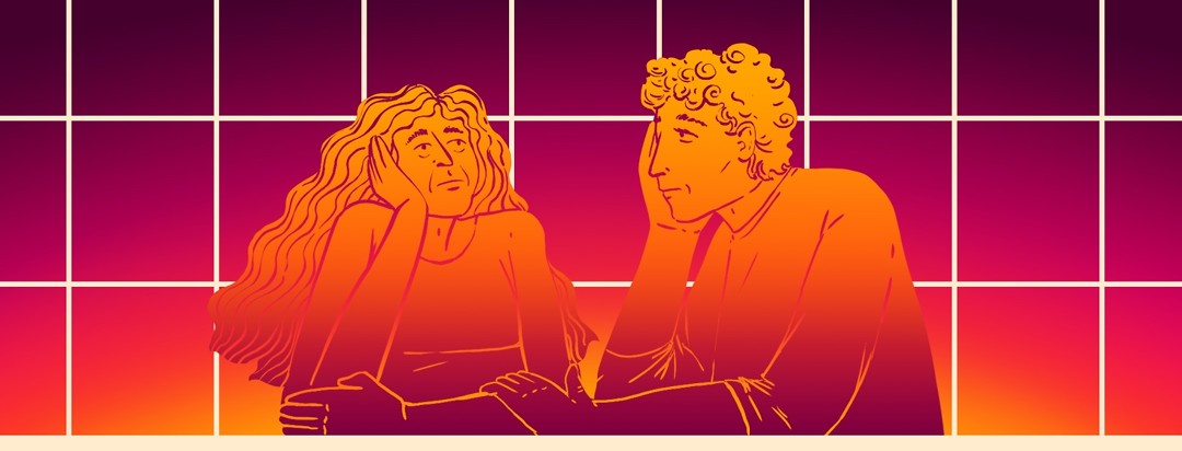 Two people sit together looking exhausted and concerned. They are sitting in front of a window showing a sunset and their own coloring mimics the sunset colors.
