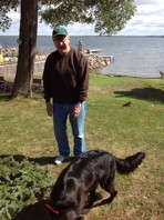 Andy with a dog in a park