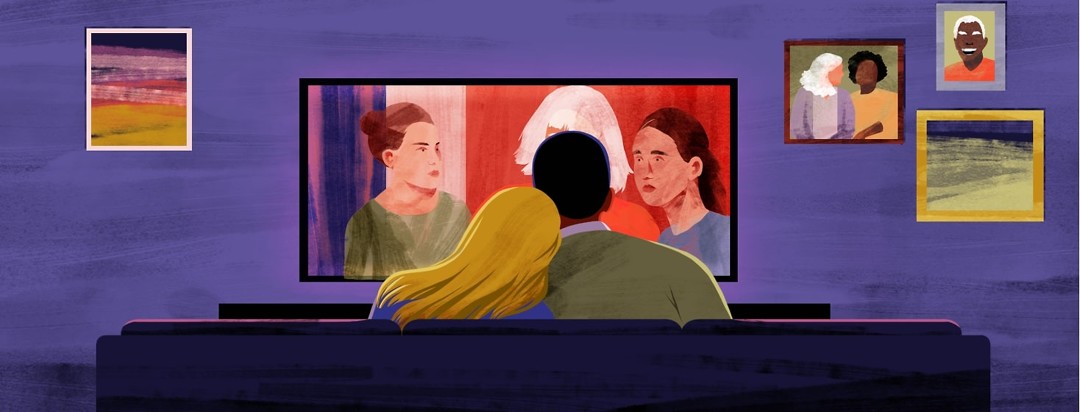 A man and a woman are shown from behind, watching a movie on a screen in front of them. Surrounded by the screen are family photos.