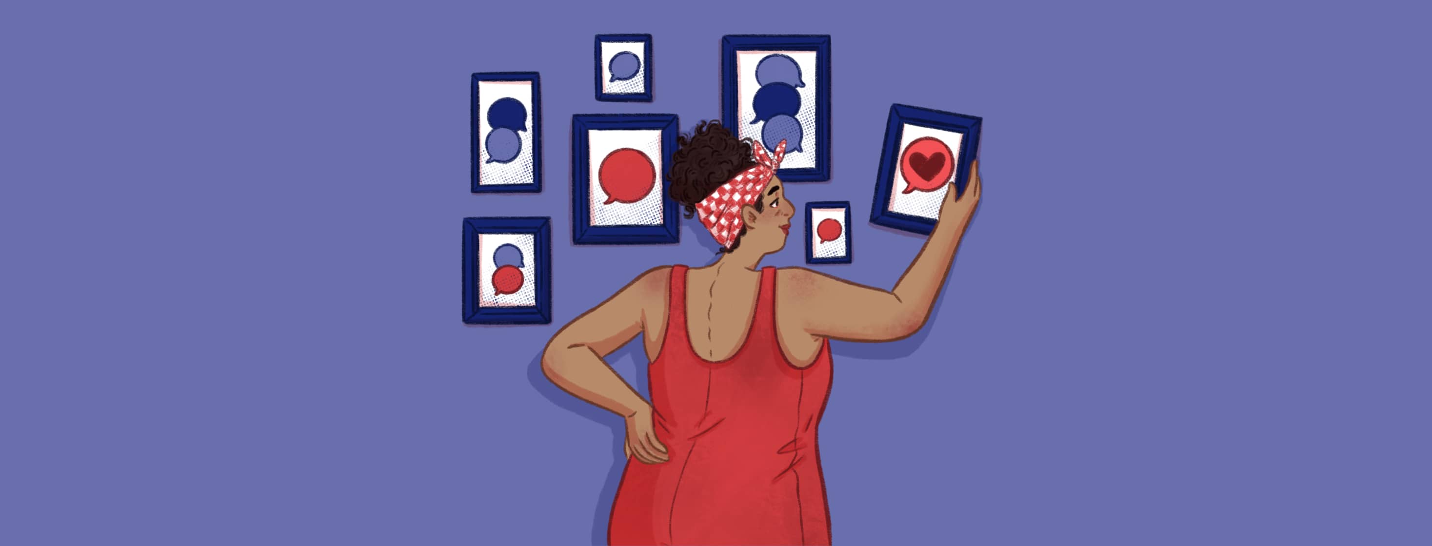 an adult female is viewed from the back straightening a picture frame containing a speech bubble with a heart in it that hangs on a gallery wall of frames containing a variety of speech bubbles