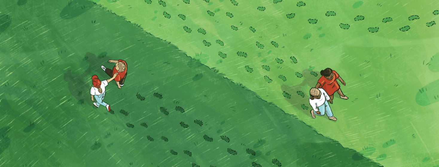 Overhead view of two shades of green grass, on one side two people are walking followed by their own footprints, on the other two people are walking and a third set of footprints veers off from them