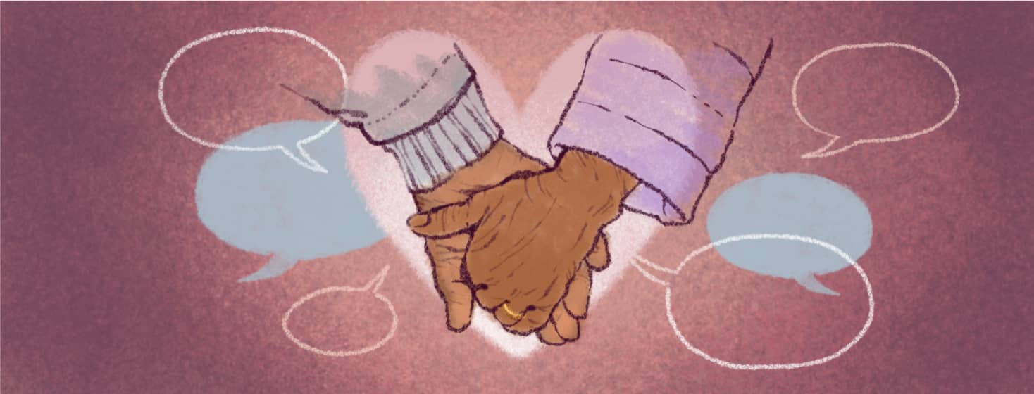 Two people hold hands inside a heart shape surrounded by speech bubbles